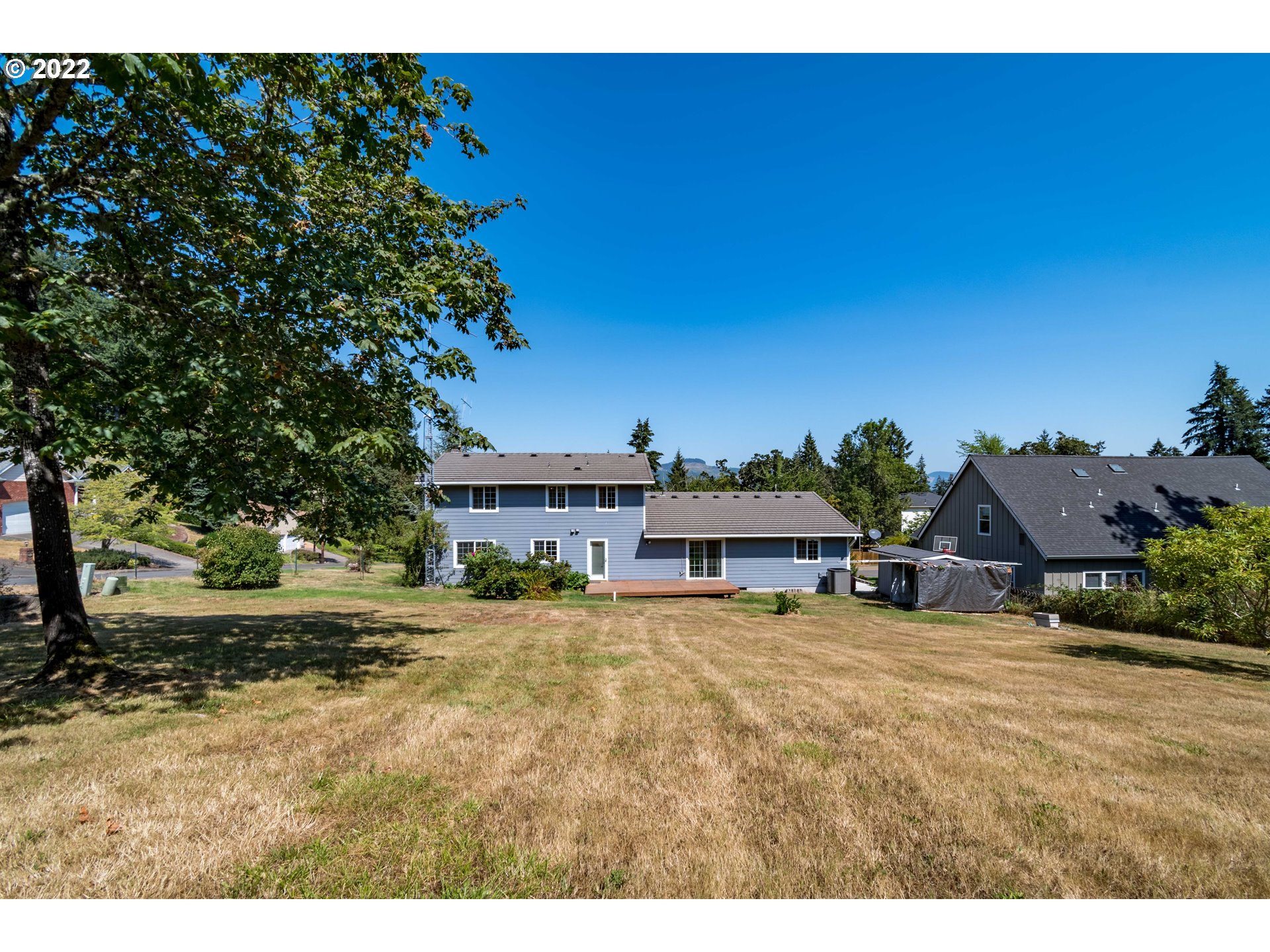 South 67th Springfield, OR 97478 - Photo 3 of 5 a view of a house with swimming pool and yard