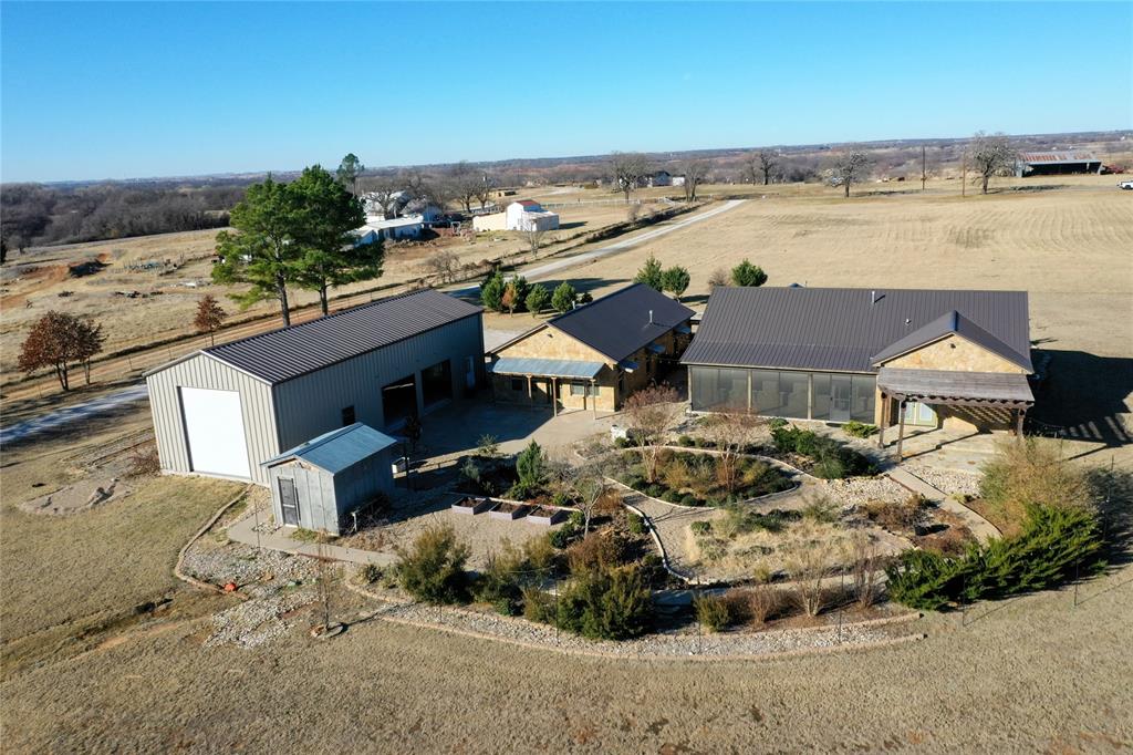 1433 County Road 1180 Decatur, TX 76234 - Photo 35 of 36 an aerial view of a house with a outdoor space
