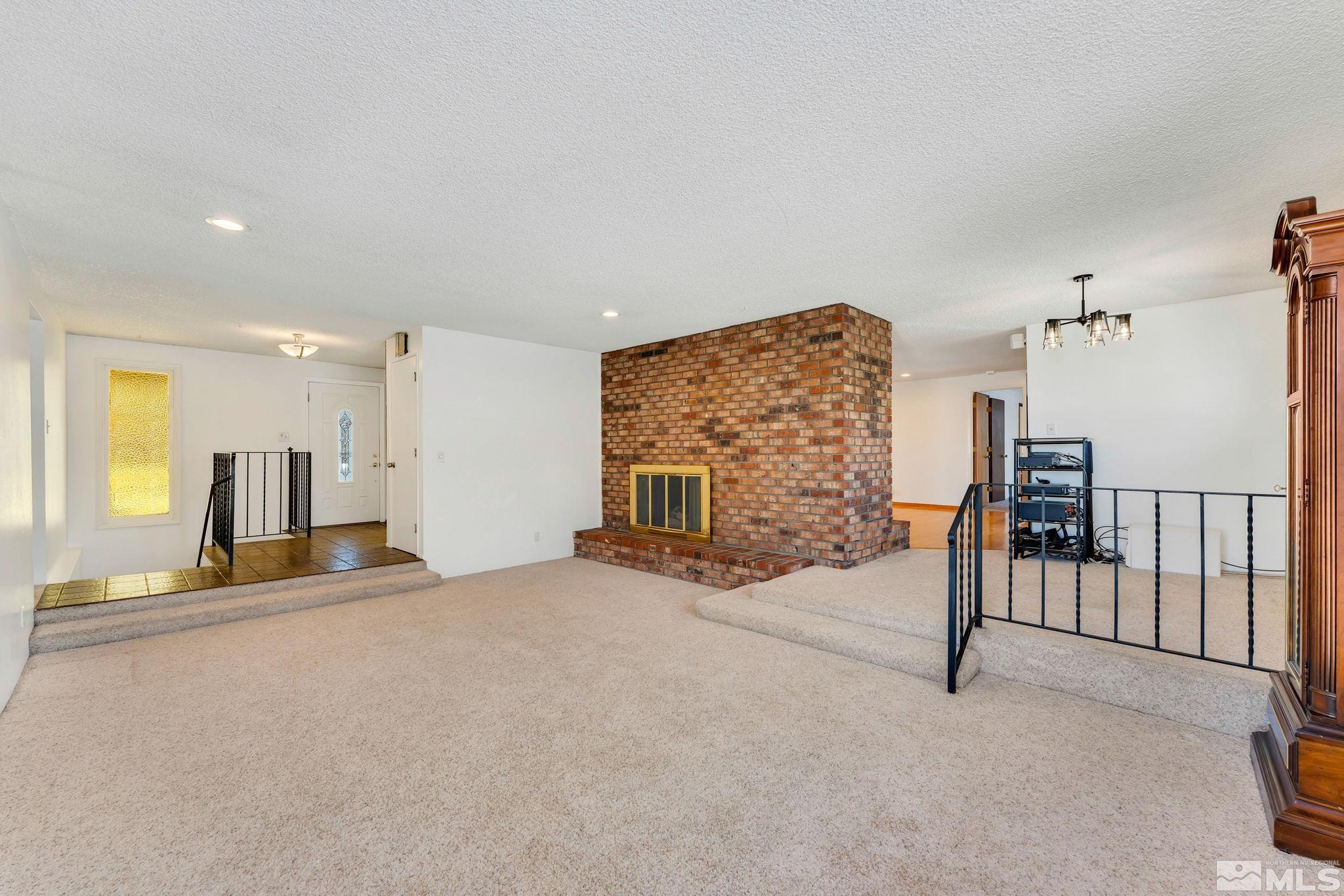 2047 Regent Street Reno, NV 89509 - Photo 4 of 28 a view of a livingroom with a staircase