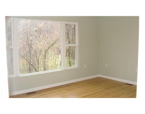 235 Stone Church Road Hunker, PA 15639 - Photo 6 of 10 Master Bedroom. MASTER BEDROOM WITH TONS OF WINDOWS, VIEW OF TREED BACKYARD