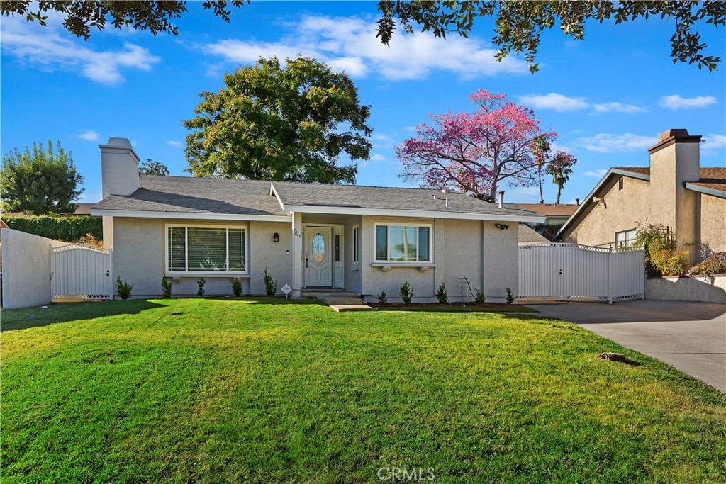 7844 Winery Ridge Drive Rancho Cucamonga, CA 91730 - Photo 1 of 1 a front view of a house with a yard and garage