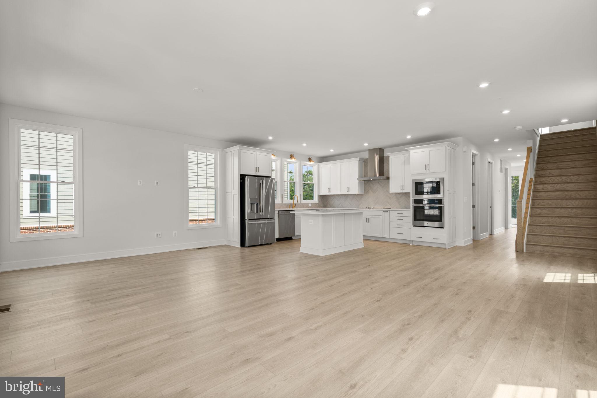 1013 Captain Richards Court Marshall, VA 20115 - Photo 13 of 44 a view of a kitchen with a sink and a stove top oven