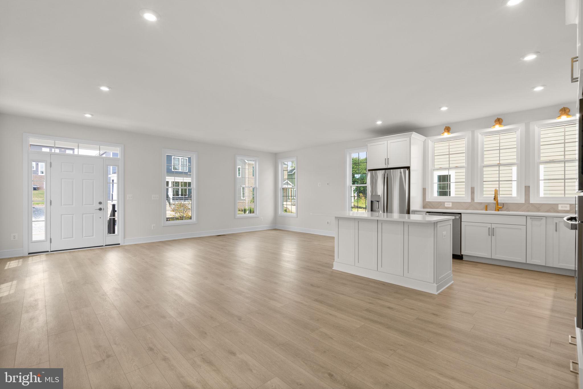 1013 Captain Richards Court Marshall, VA 20115 - Photo 15 of 44 a view of kitchen with center island and stainless steel appliances