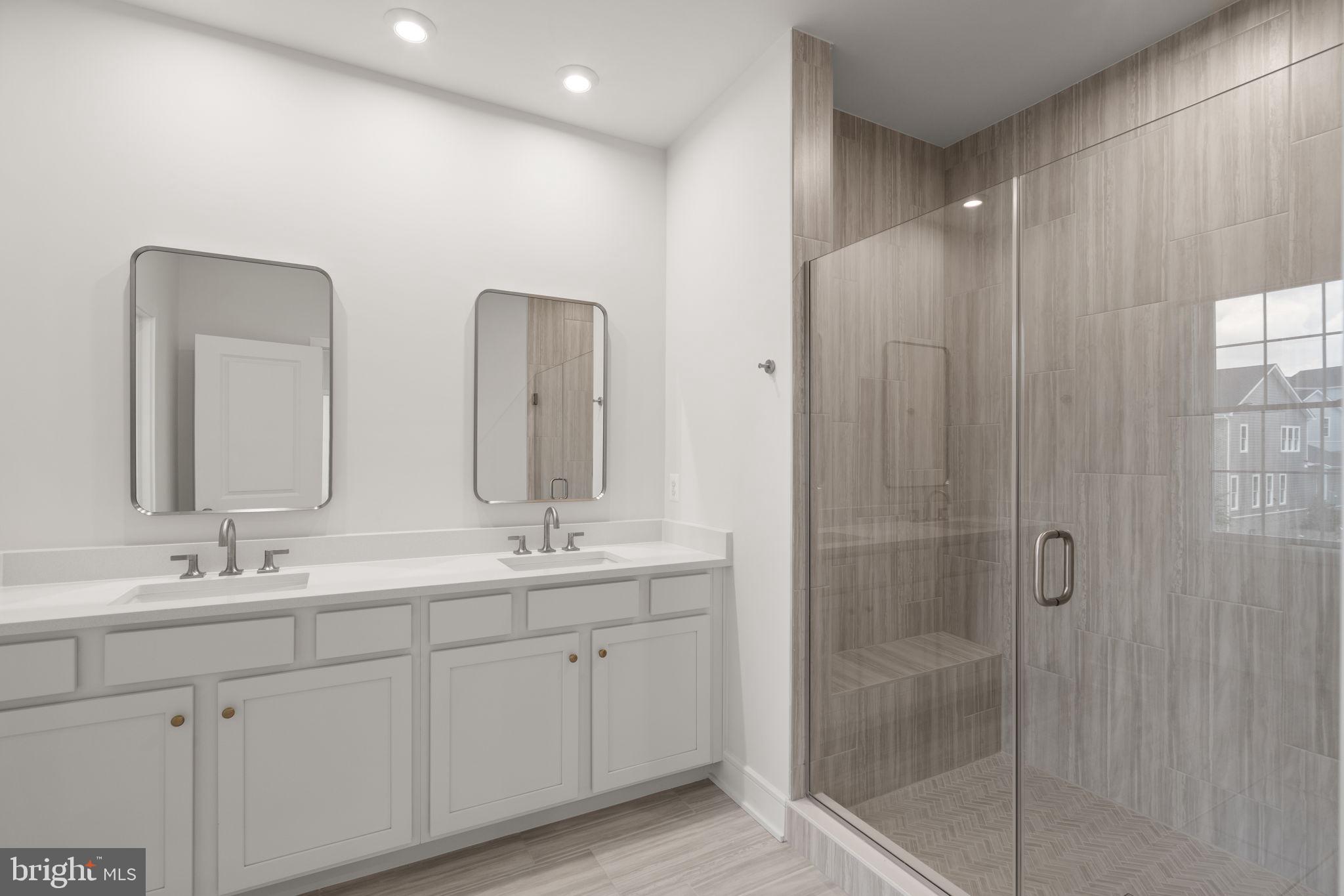 1013 Captain Richards Court Marshall, VA 20115 - Photo 28 of 44 a bathroom with double vanity sinks and a shower