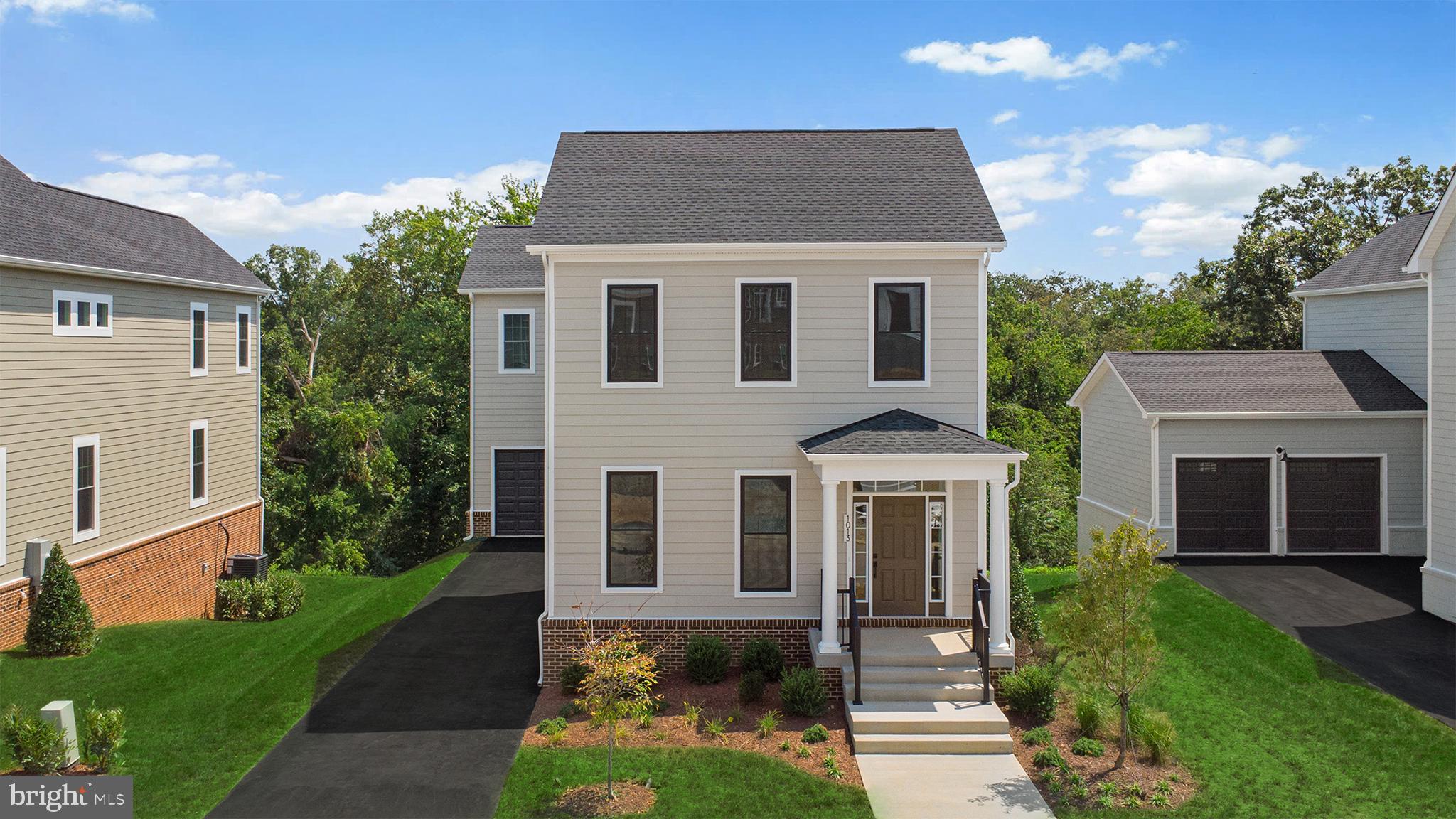 1013 Captain Richards Court Marshall, VA 20115 - Photo 3 of 44 a front view of a house with garden