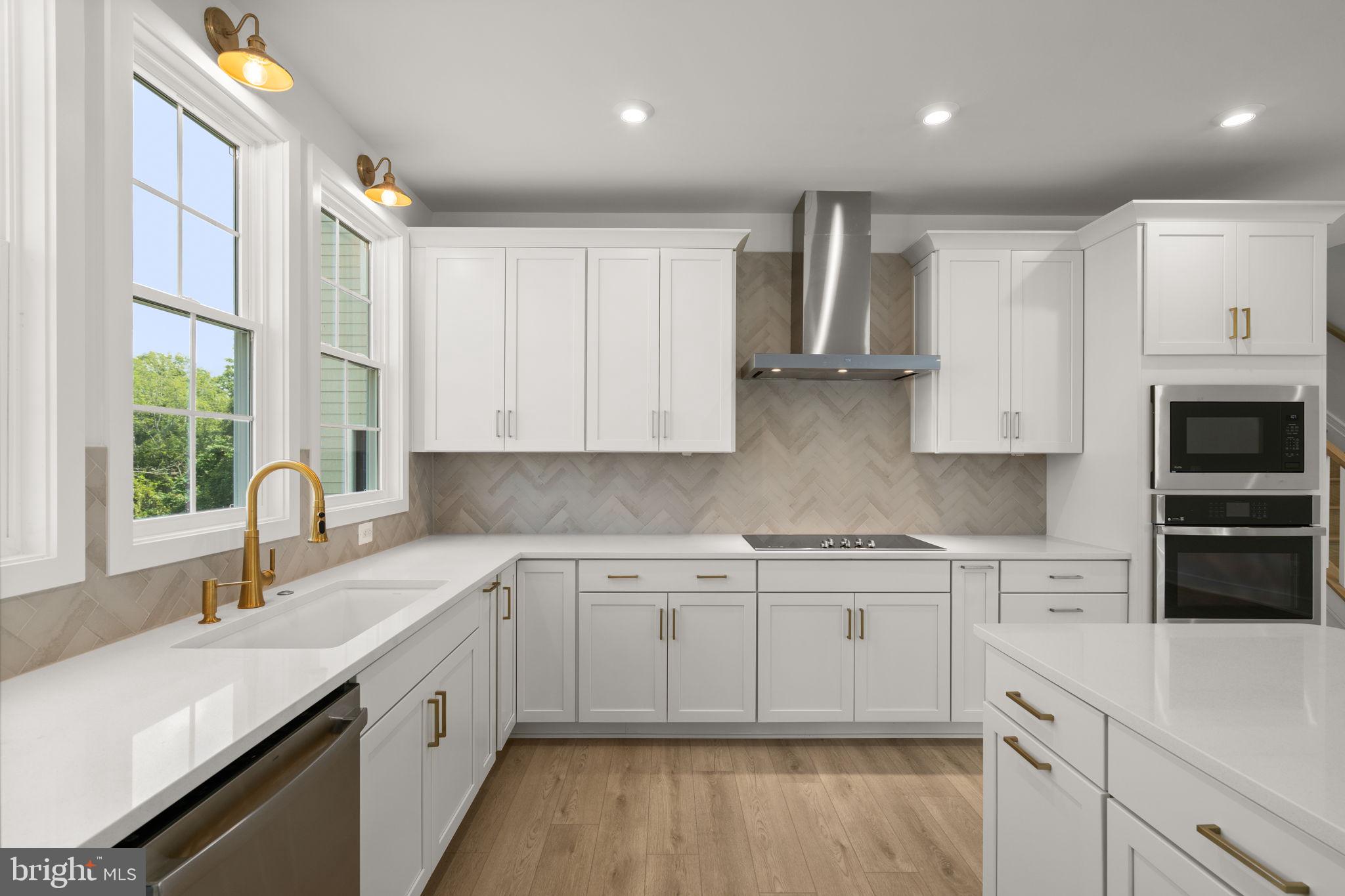 1013 Captain Richards Court Marshall, VA 20115 - Photo 9 of 44 a kitchen with cabinets appliances a sink and a window