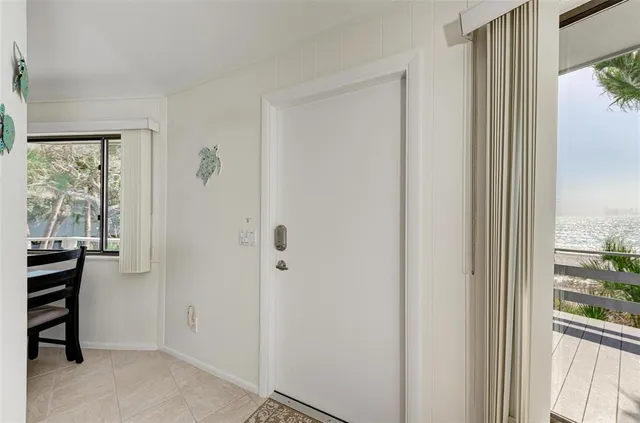 a bedroom with furniture and a flat screen tv
