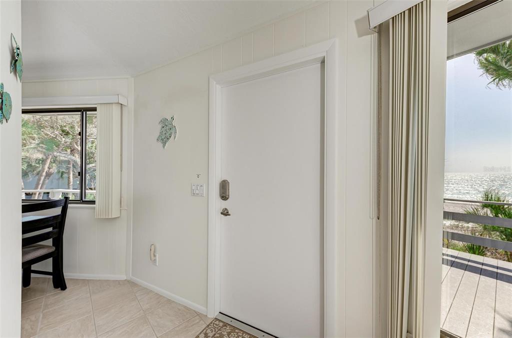 6590 Manasota Key Road Englewood, FL 34223 - Photo 11 of 69 a view of room with window and furniture