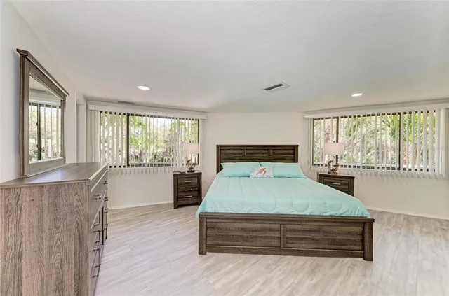 a bathroom with a shower and a toilet