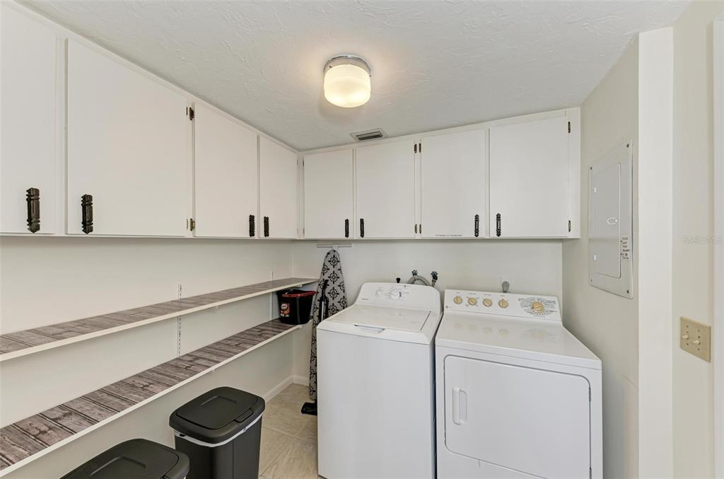 6590 Manasota Key Road Englewood, FL 34223 - Photo 37 of 69 a view of washer and dryer