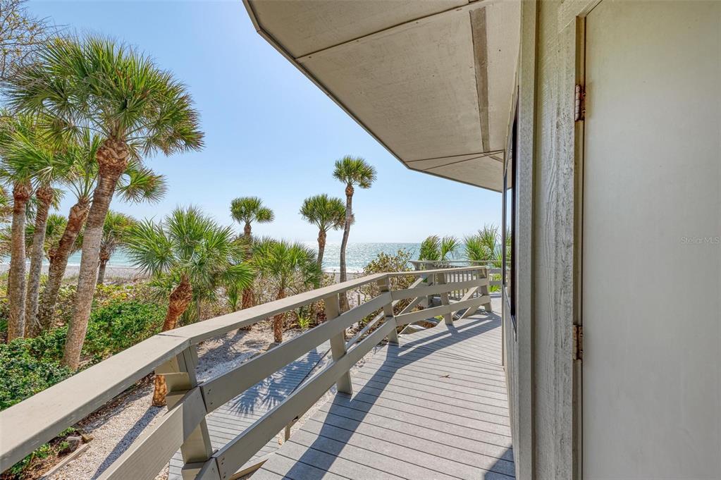 6590 Manasota Key Road Englewood, FL 34223 - Photo 43 of 69 a view of a balcony with wooden floor