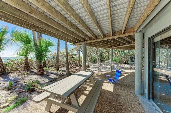 a view of a yard and an ocean