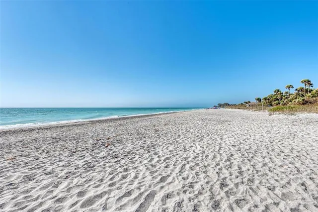 an aerial view of a house with a swimming pool