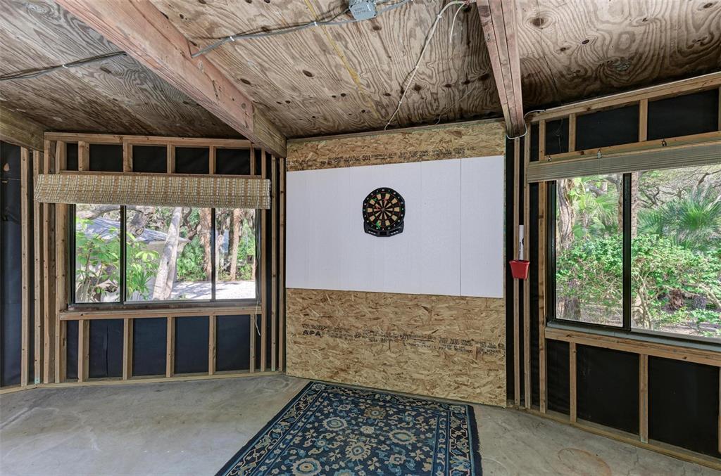 6590 Manasota Key Road Englewood, FL 34223 - Photo 56 of 69 a view of a door and wooden floor