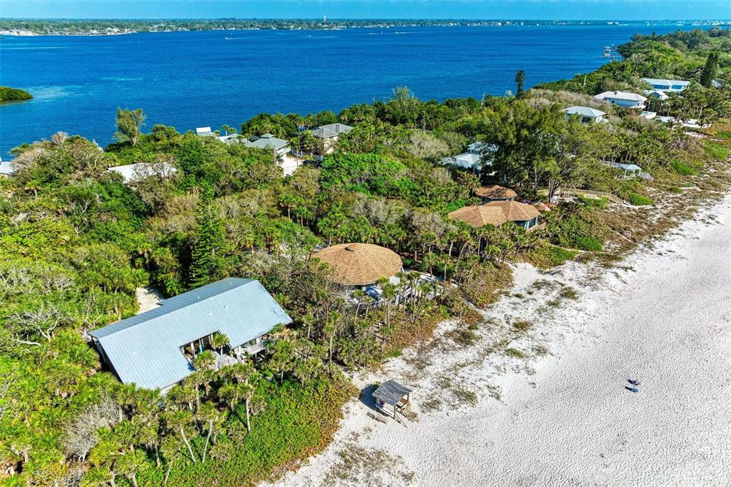6590 Manasota Key Road Englewood, FL 34223 - Photo 60 of 69 a view of a yard and an ocean
