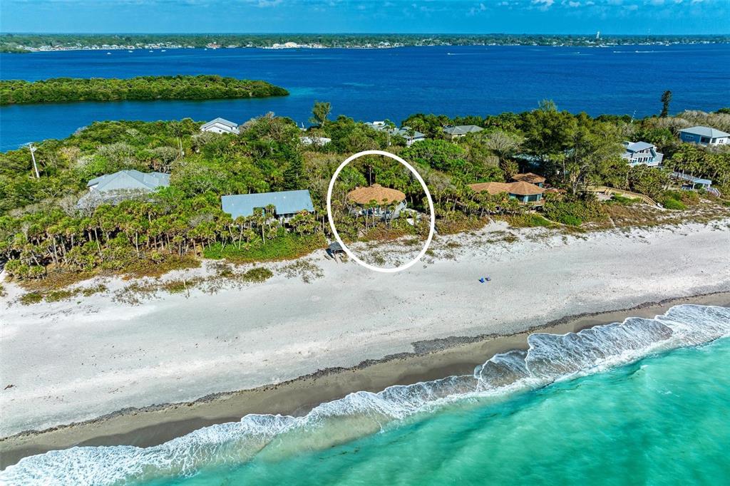 6590 Manasota Key Road Englewood, FL 34223 - Photo 61 of 69 a view of a lake with a beach