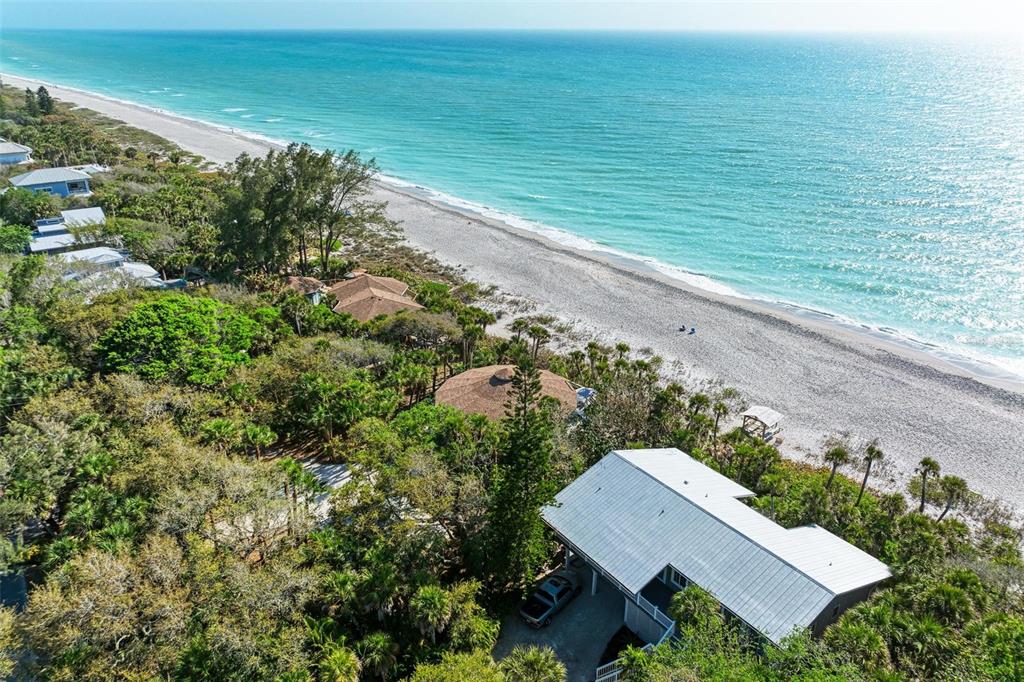 6590 Manasota Key Road Englewood, FL 34223 - Photo 64 of 69 a view of a yard with an outdoor space