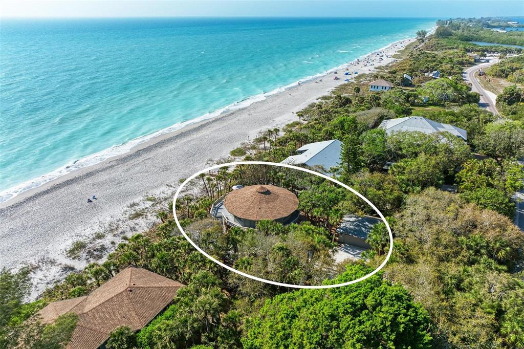 6590 Manasota Key Road Englewood, FL 34223 - Photo 68 of 69 an aerial view of a house with a swimming pool