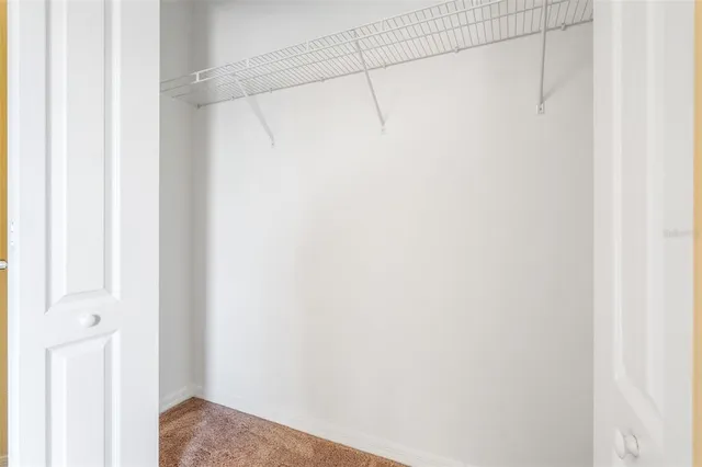 a view of a room with racks on the wall