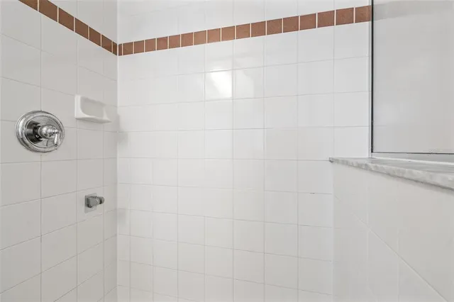 an aerial view of residential house with outdoor space and swimming pool