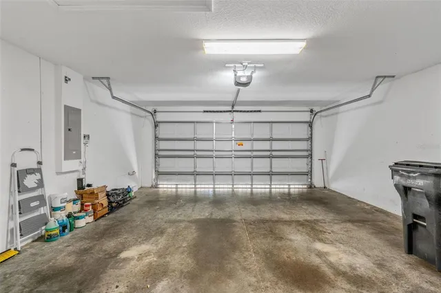 a view of a house with a yard and plants