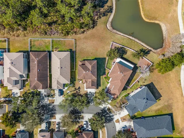 a view of outdoor living space with furniture and city view