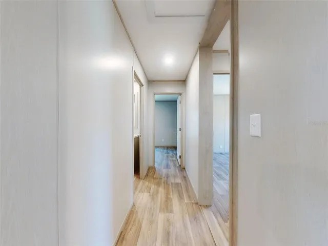 a view of a room with racks on the wall