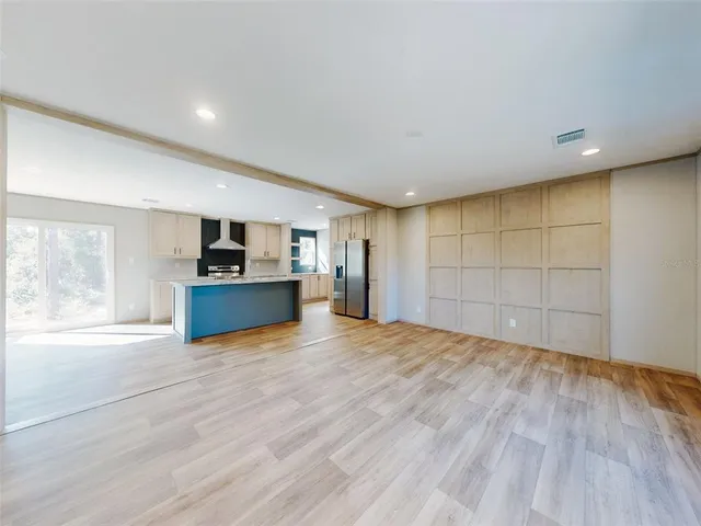 a view of kitchen with wooden floor