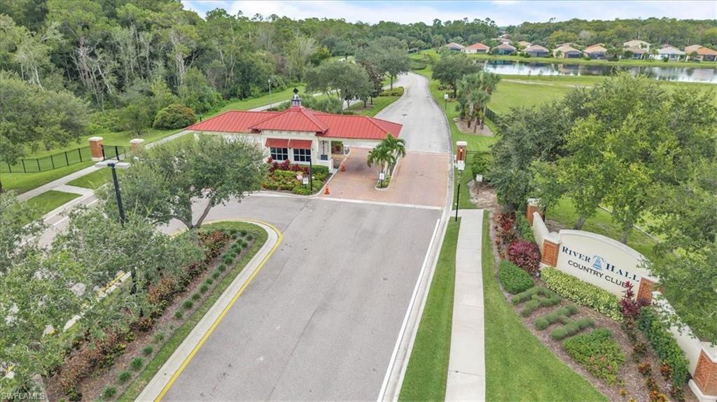 16424 Windsor Way Alva, FL 33920 - Photo 39 of 48 an aerial view of a house with a garden and lake view
