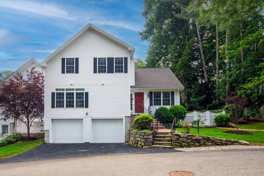 10 Rivard Road, Unit 10 Needham, MA 02492 - Photo 1 of 29 a house view with a garden space