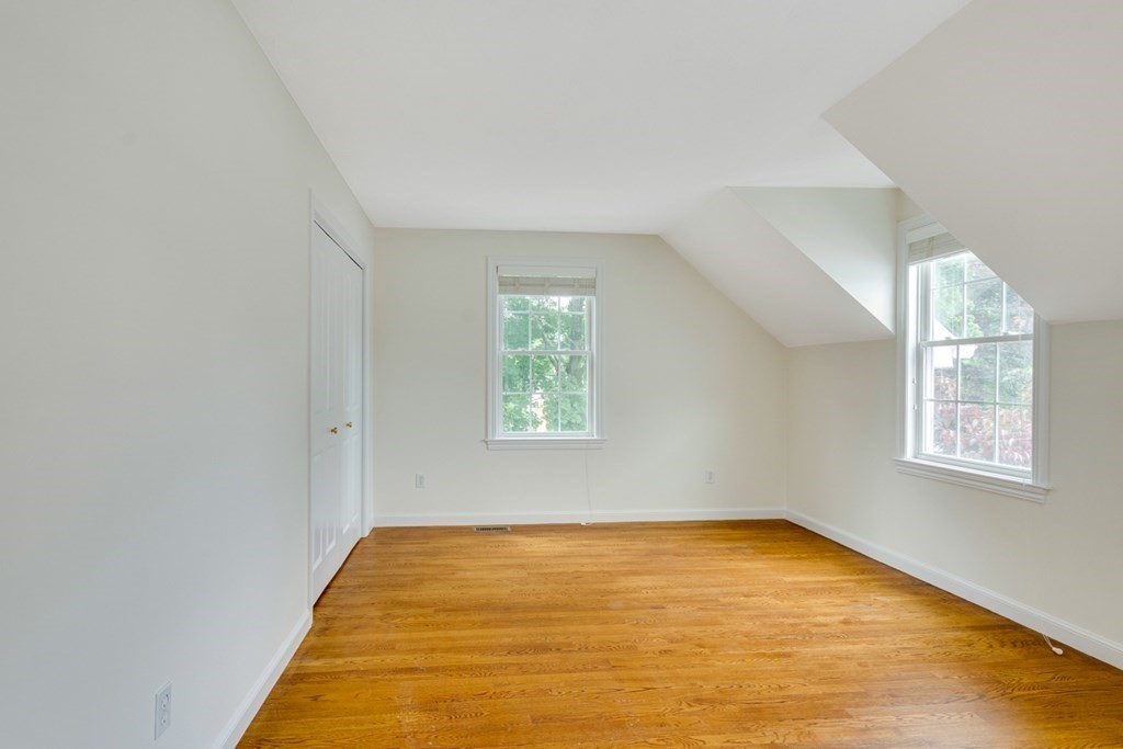 10 Rivard Road, Unit 10 Needham, MA 02492 - Photo 19 of 29 a view of an empty room with a window
