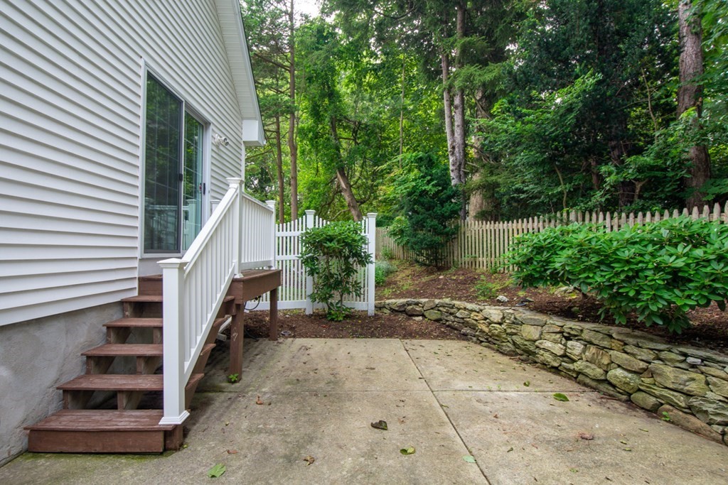 10 Rivard Road, Unit 10 Needham, MA 02492 - Photo 25 of 29 a view of outdoor space and deck