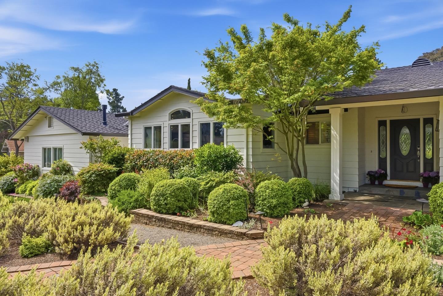 285 Ridgeway Road Woodside, CA 94062 - Photo 27 of 28 a front view of a house with a yard
