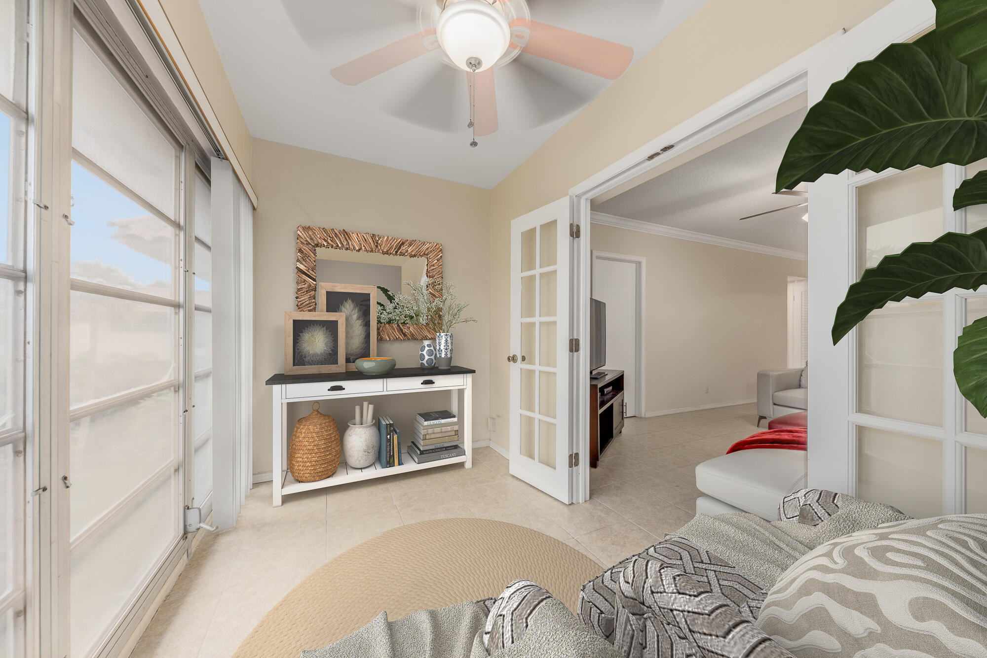 400 Northeast 20th Street, Unit D307 Boca Raton, FL 33431 - Photo 15 of 34 a bedroom with a bed and a couch