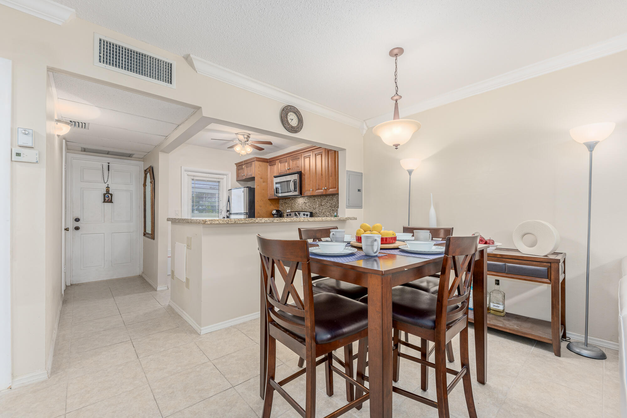 400 Northeast 20th Street, Unit D307 Boca Raton, FL 33431 - Photo 18 of 34 a view of a dining room with furniture