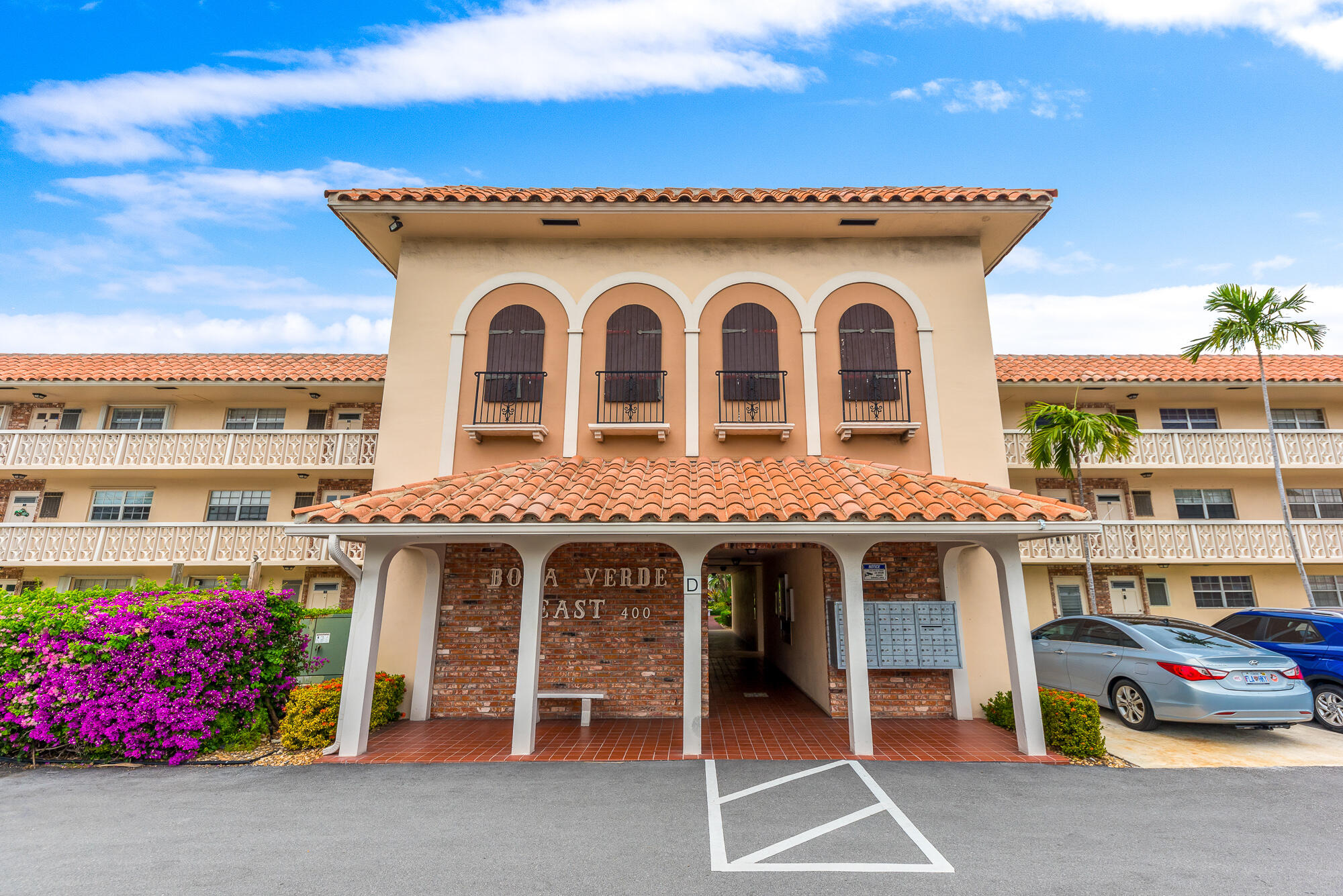 400 Northeast 20th Street, Unit D307 Boca Raton, FL 33431 - Photo 8 of 34 a front view of a house with outdoor space