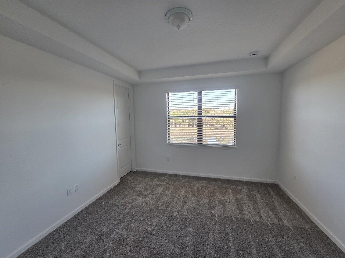 7783 Southwest Bentley Lane Stuart, FL 34997 - Photo 16 of 27 Master bedroom