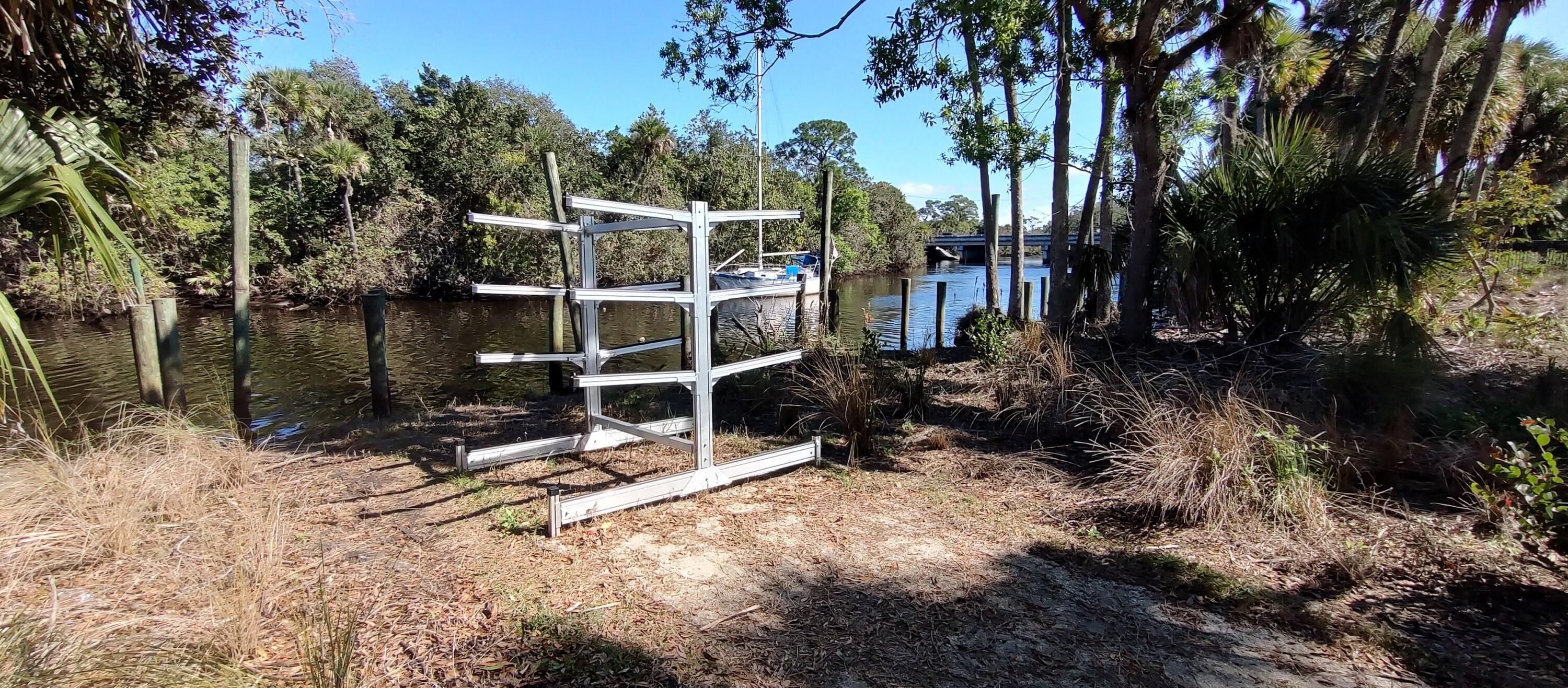 7783 Southwest Bentley Lane Stuart, FL 34997 - Photo 26 of 27 Canoe storage and launch