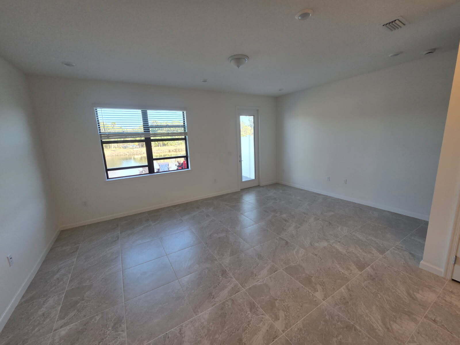 7783 Southwest Bentley Lane Stuart, FL 34997 - Photo 5 of 27 Living room 1