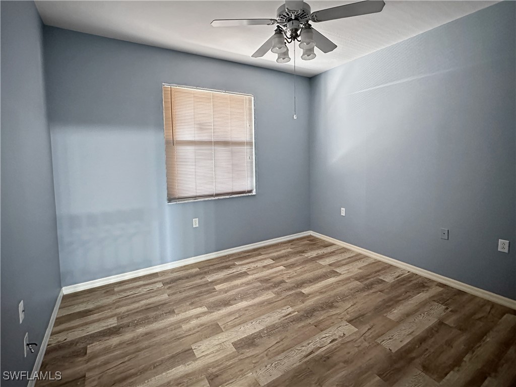 8451 Kingbird Loop, Unit 345 Estero, FL 33967 - Photo 9 of 10 a view of an empty room with a window