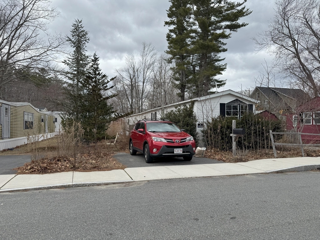 3 Adams Street Salisbury, MA 01952 - Photo 2 of 10 a car parked in front of a house