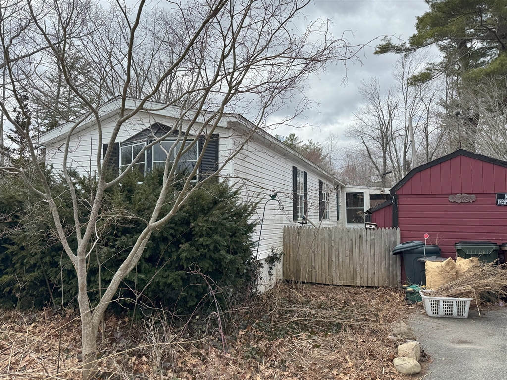 3 Adams Street Salisbury, MA 01952 - Photo 3 of 10 a view of a house with a yard