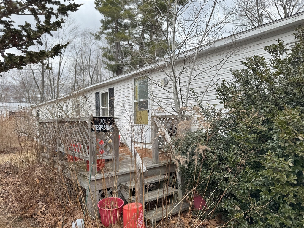 3 Adams Street Salisbury, MA 01952 - Photo 6 of 10 a front view of a house with a yard
