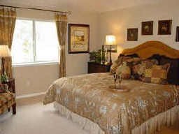 3606 Primrose Trace Lane Spring, TX 77389 - Photo 7 of 10 a bed sitting in a bedroom next to a window