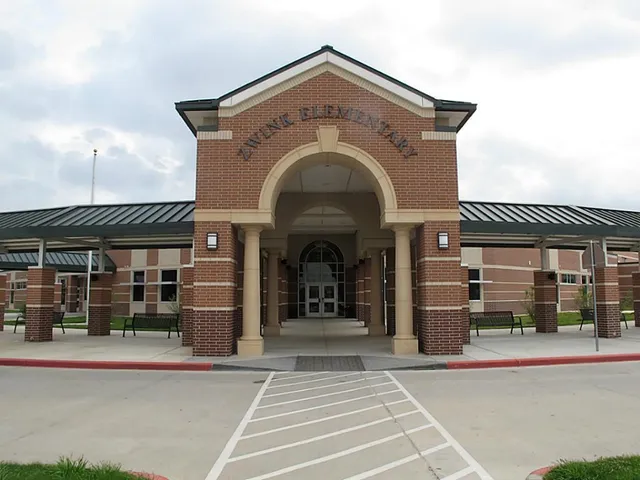 a view of a house with entrance gate