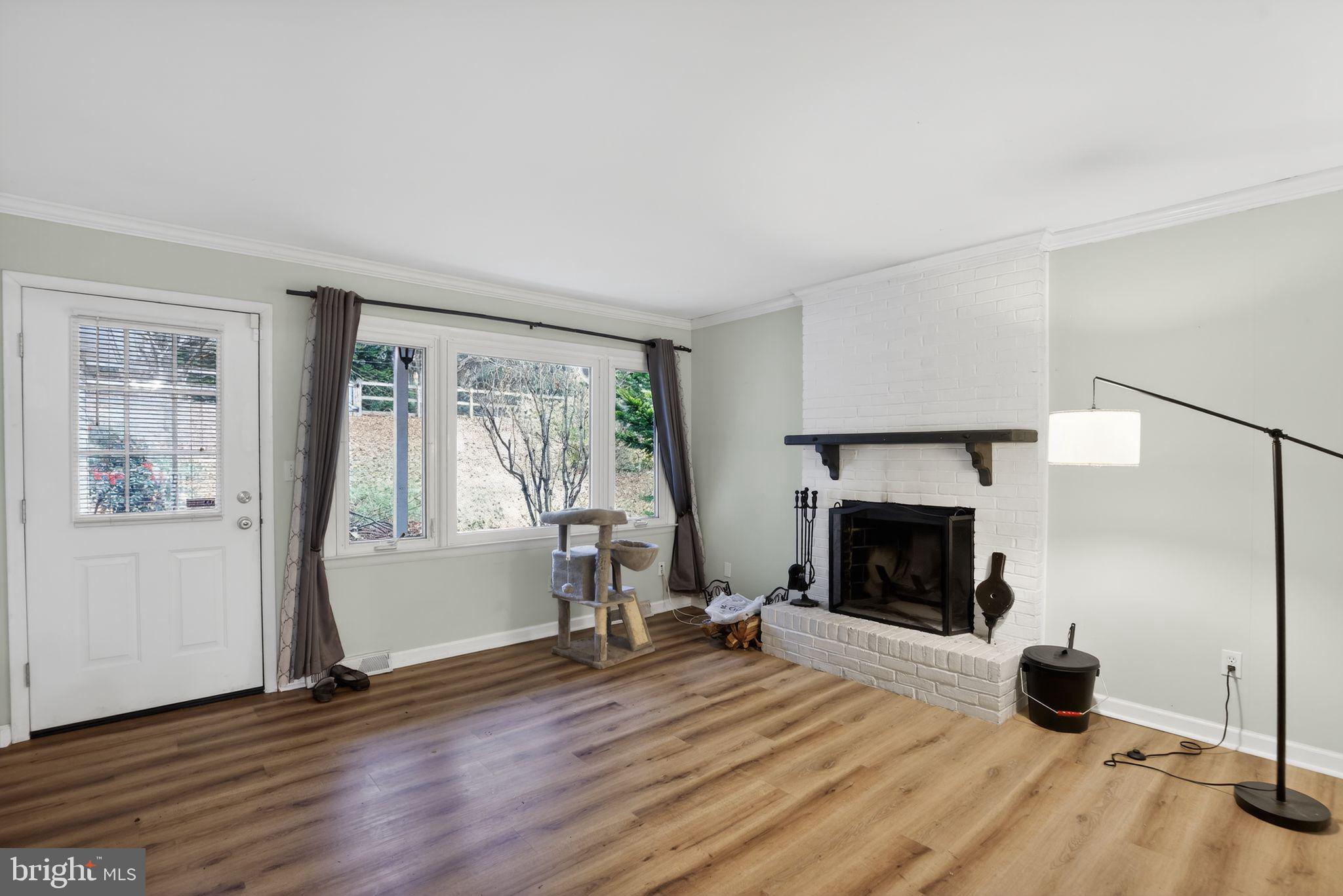 1201 North Tollgate Road Bel Air, MD 21014 - Photo 12 of 41 a living room with furniture and a fireplace
