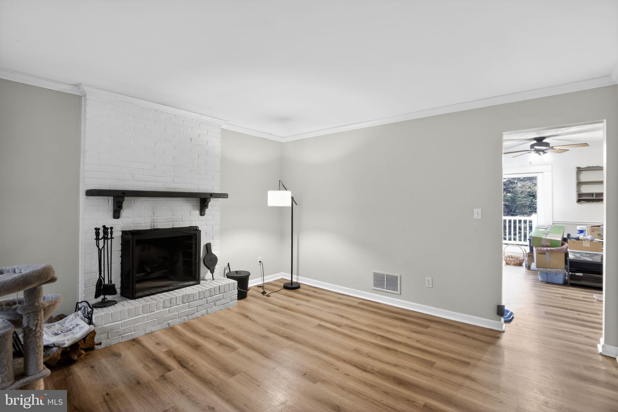 1201 North Tollgate Road Bel Air, MD 21014 - Photo 13 of 41 a bedroom with bed and a fireplace