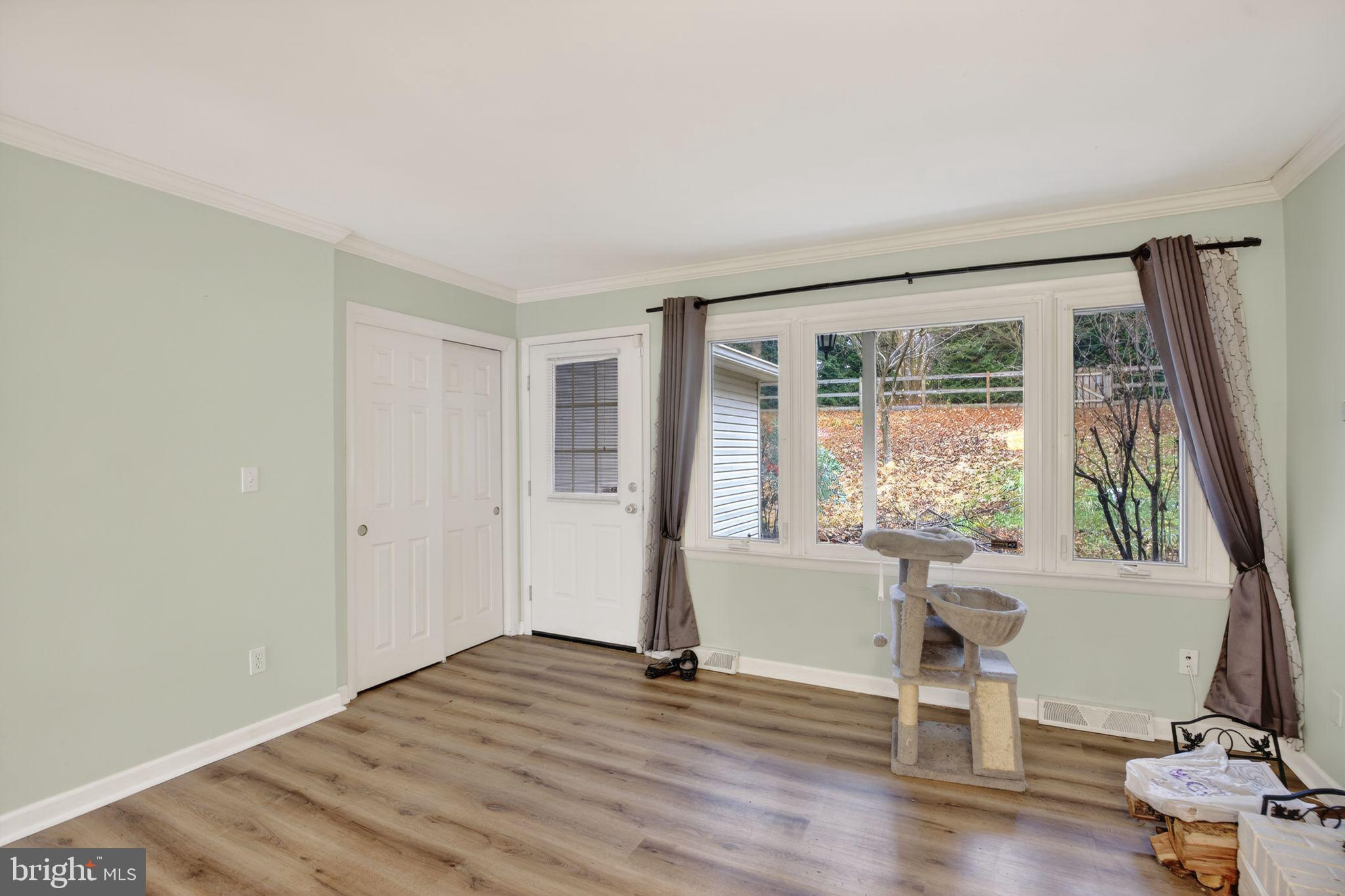 1201 North Tollgate Road Bel Air, MD 21014 - Photo 14 of 41 a view of empty room with wooden floor and fan