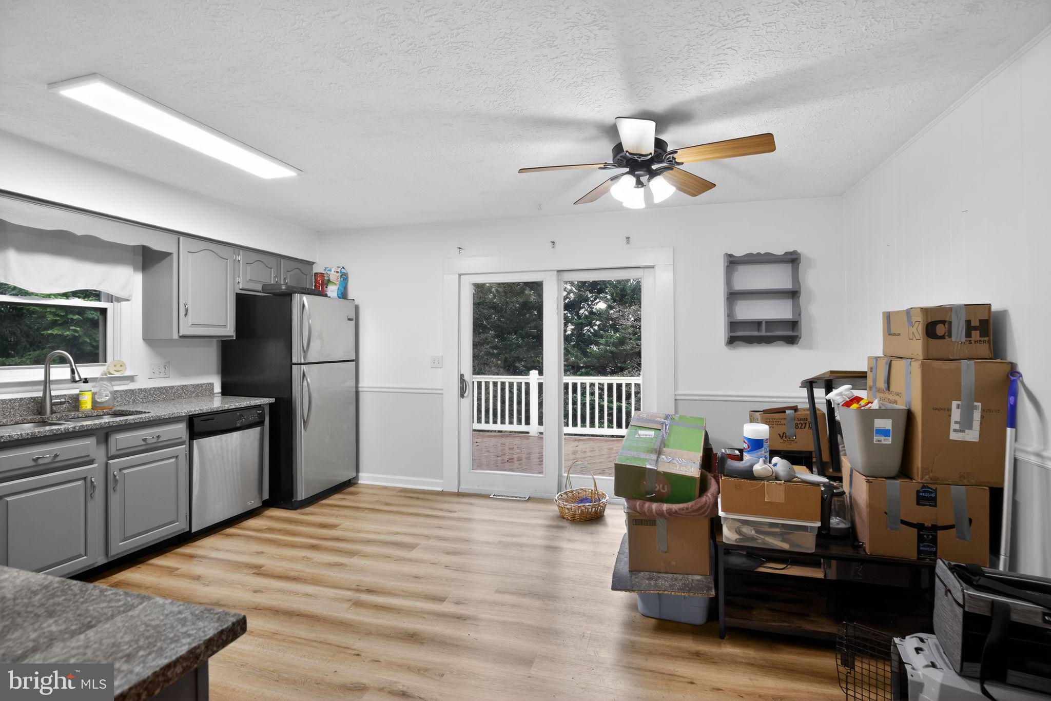 1201 North Tollgate Road Bel Air, MD 21014 - Photo 15 of 41 a living room with furniture a window and a chandelier