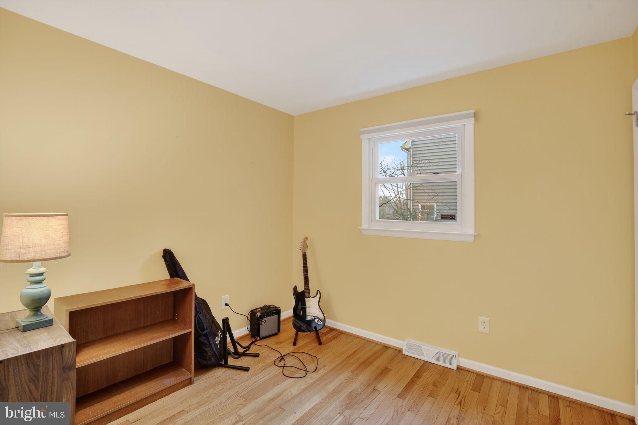 1201 North Tollgate Road Bel Air, MD 21014 - Photo 21 of 41 a view of workspace with wooden floor and chair